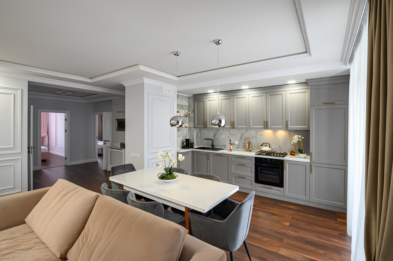 Modern furnished apartment with an open-concept kitchen, dining area and living room